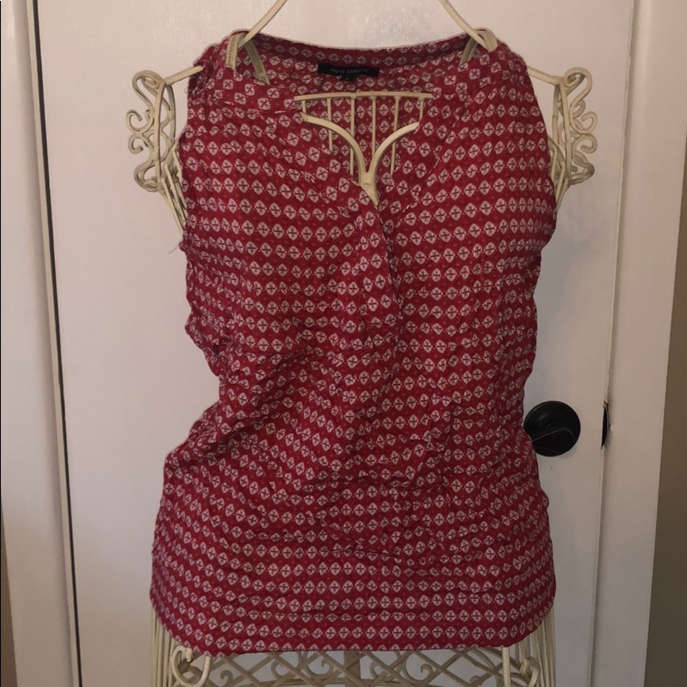 Red sleeveless shirt